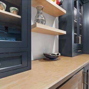 News 1 blue cabinets of kitchen with various antiques